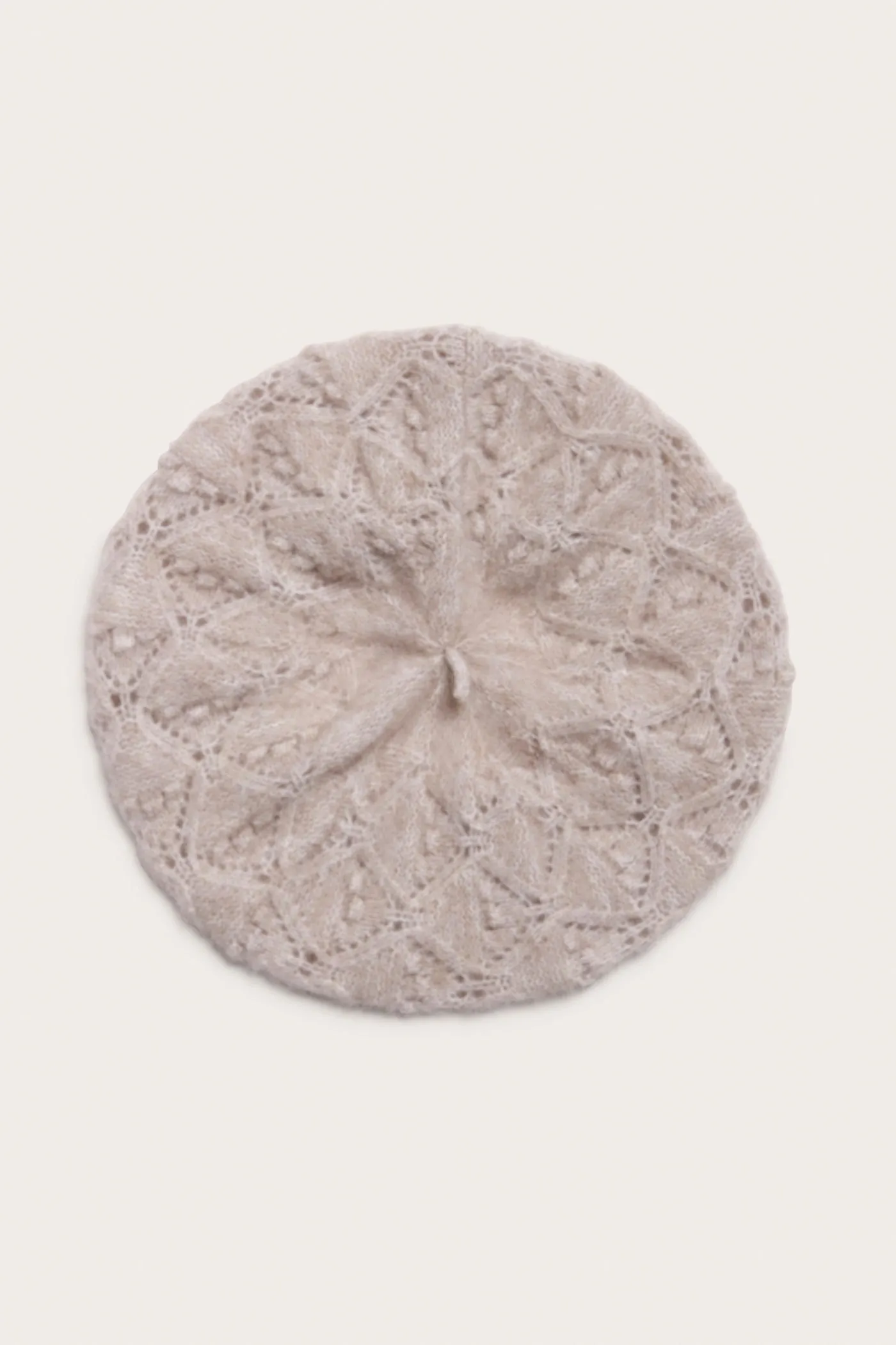 Women's beige knitted beret